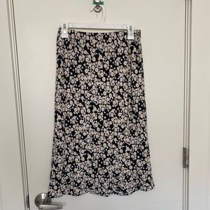 long silk skirt hits under the knee